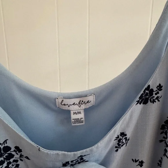 Light Blue Dress with Navy Floral Pattern and Rosette Detail - Picture 4 of 5